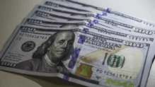 Dólar volta a R$ 5 com ambiente externo e ajuste pós-eleitoral